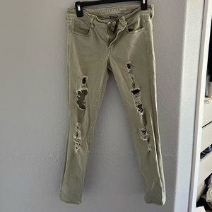 Green American Eagle Ripped Skinny Jeans